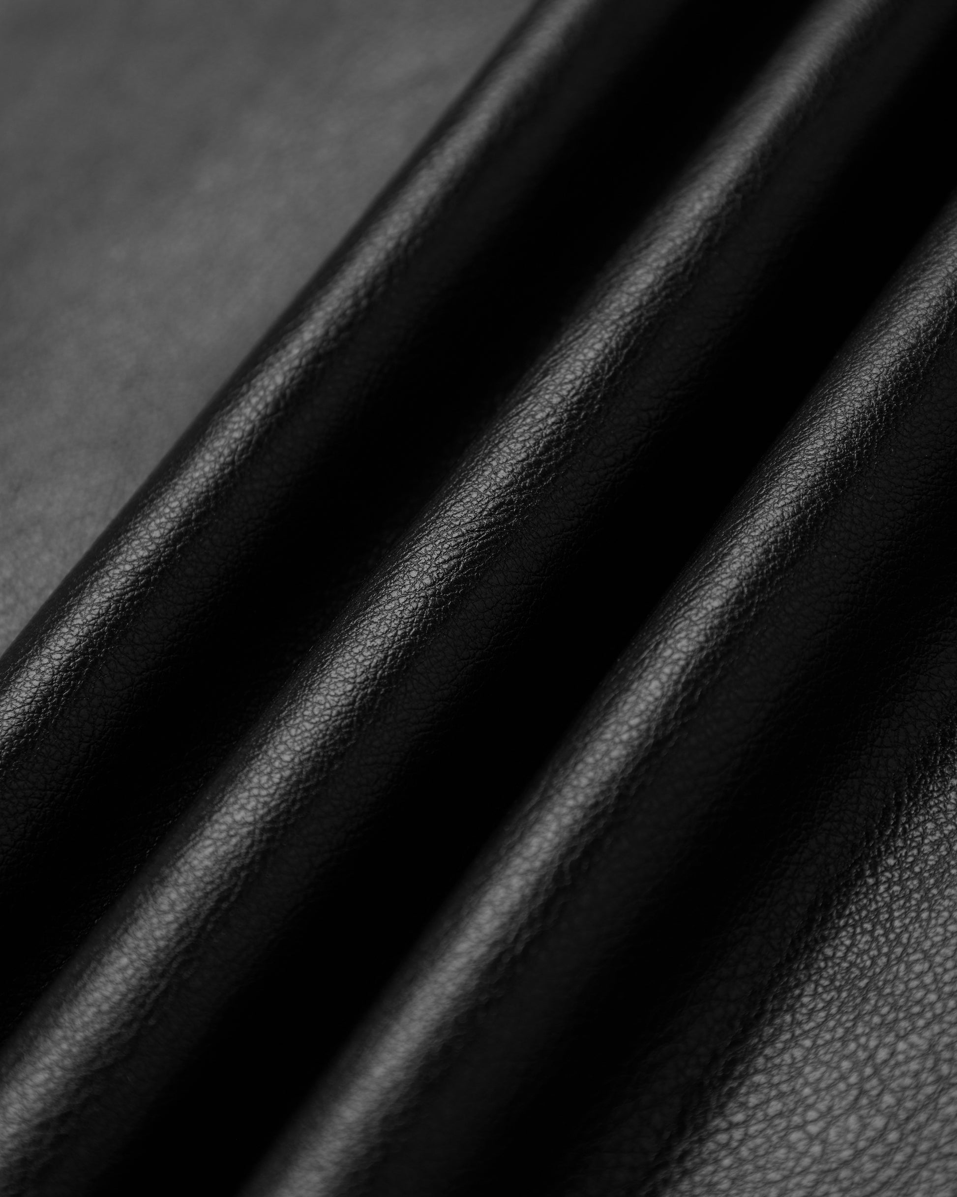 ACCEPTANCE FAUX LEATHER TROUSERS